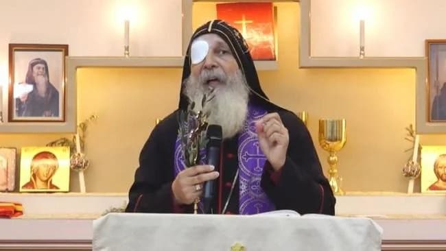 Assyrian Bishop returns to church wearing eyepatch after stabbing attack