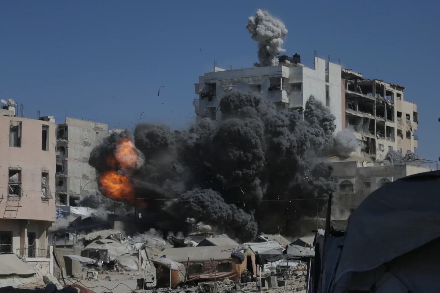 Israeli airstrikes kill 32 in Gaza city as army orders mass evacuation