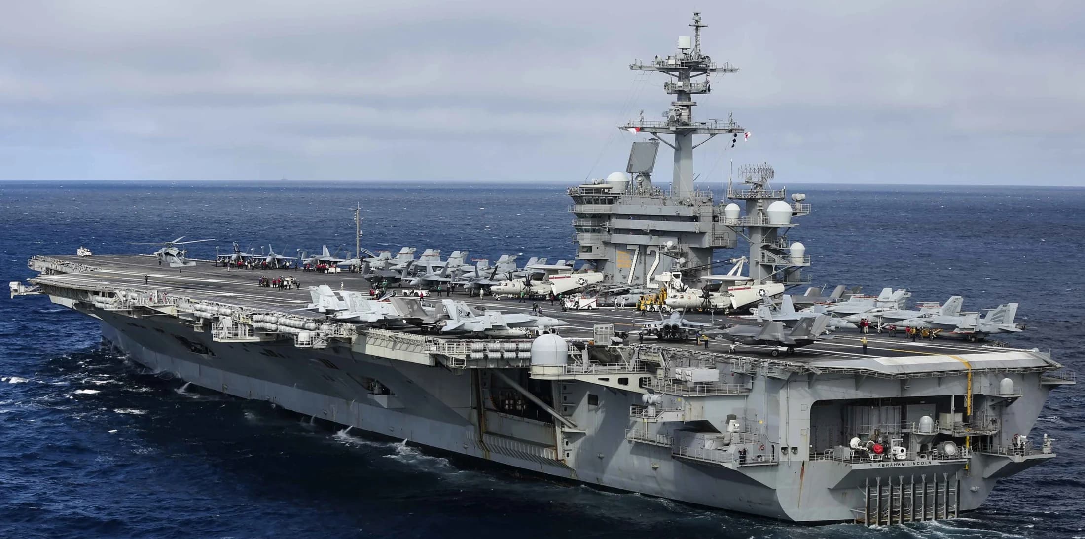 A generic image of USS Abraham Lincoln, a Nimitz‑class aircraft carrier. Iran claims it fired missiles at the ship in the Persian Gulf, but the U.S. military says the vessel was not hit.