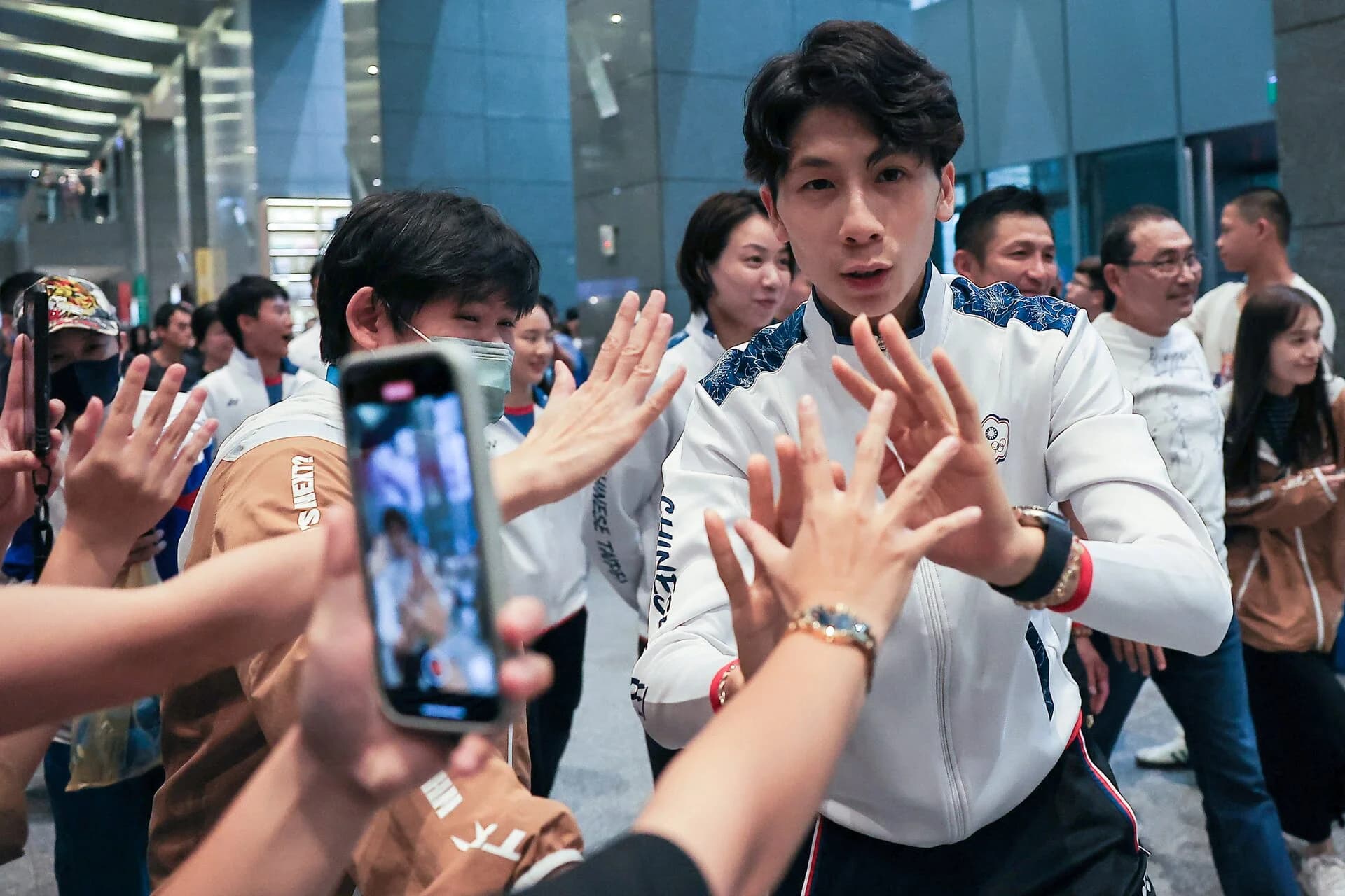 Gold medalist boxer Lin Yu-ting interact with fans as she attends an event in New Taipei City