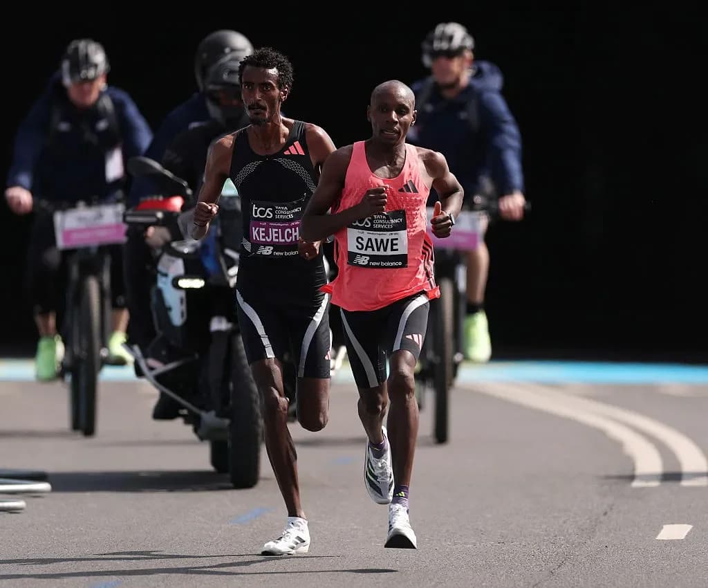 Sabastian Sawe of Team Kenya leads Yomif Kejelcha of Team Ethiopia near the end of the Men's 2026 TCS London Marathon on April 26.